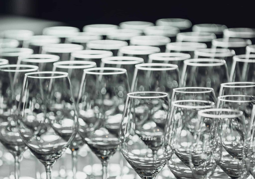 Empty wine glasses on table in restaurant